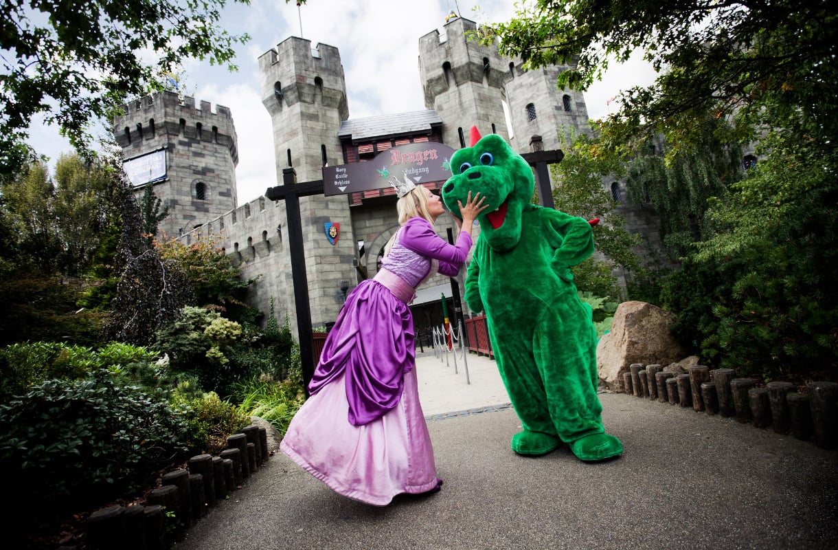Princess kissing a dinosaur